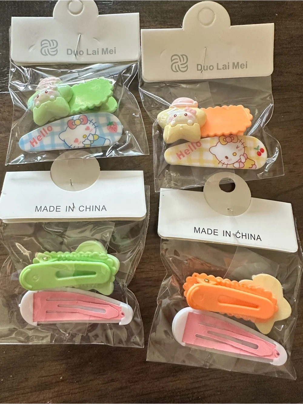 NWT Set of 4 Hello Kitty Child Size Hair Clips Barretts Green Orange Blue Yellow